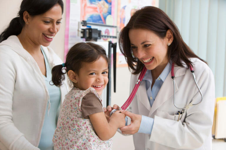 Pediatric doctor providing child health services and check-up at Nawadipa Medical Care Bali.