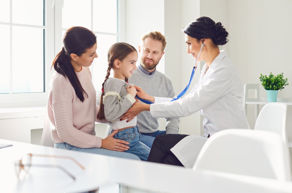 Group of doctors providing children’s medical check-up as part of Nawadipa Medical Care Child Health Services.