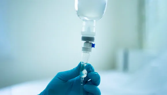 Close-up of IV Infusion process at IV Drip Kedungu wellness center.