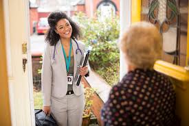 Doctor providing medical assistance at home during home healthcare visit in Tanah Lot area.